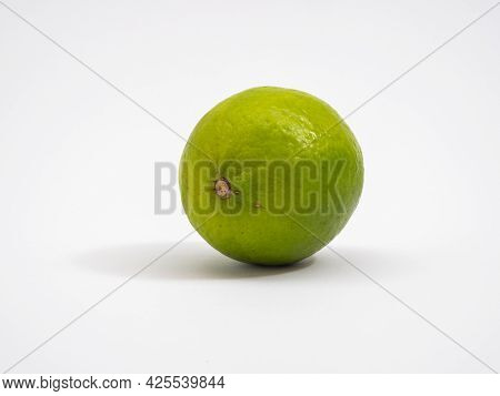 Limes On A White Background. Fresh And Ripe. Healthy Lifestyle Concept.