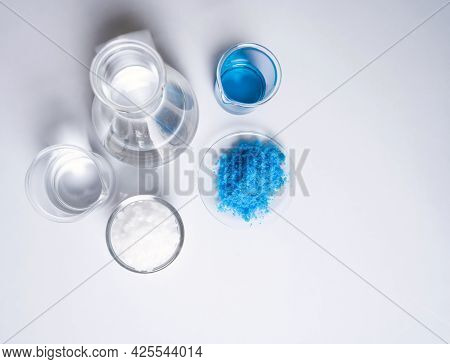 Inorganic Chemical On White Laboratory Table. Copper(ii) Sulfate, Microcrystalline Wax, Alcohol. Che
