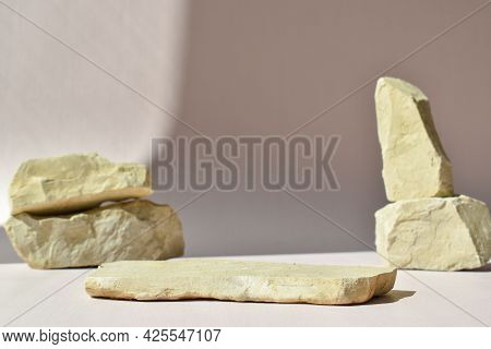 Minimalistic Scene Of A Lying Stone On A Background Of Stones. Catwalk For The Presentation Of Produ