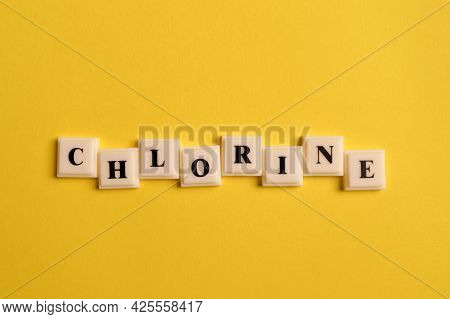 Square Letters With Text Chlorine Isolated On Yellow Background
