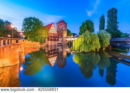 Nuremberg, Germany. Colourful And Picturesque View Of The Half-timbered Old Houses On The Banks Of T