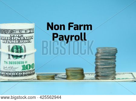 Banknotes, Coins, Notebooks With The Words Non Farm Payroll