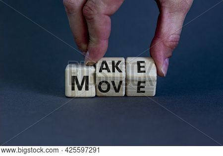 Make Your Move Symbol. Businessman Turns Wooden Cubes With Words 'make Move'. Beautiful Grey Backgro