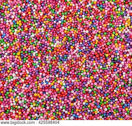 Abstract Background Texture Of Multicolor Expanded Polystyrene Balls, Close Up