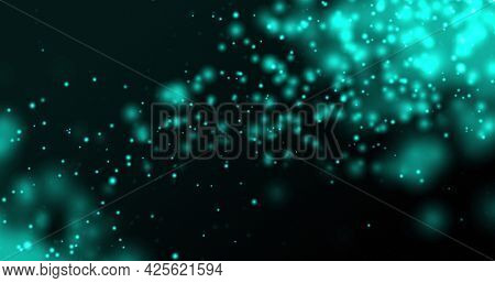 Glowing blue particles floating upwards on a dark background. light, colour, energy and movement concept, digitally generated image.