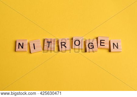 Square Letters With Text Nitrogen Isolated On Yellow Background