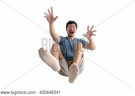 Funny Full Body Of Shocked Asian Man Being Blown Away On Isolated Background.