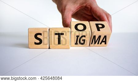 Stop Stigma Symbol. Doctor Turns Cubes With Words Stop Stigma. Beautiful White Background. Medical A