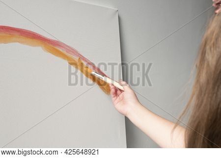 Kid Drawing Red Line Art With Paints