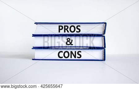 Pros And Cons Symbol. Books With Words 'pros And Cons'. Beautiful White Background. Business, Pros A