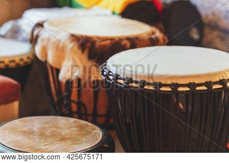 Various Ethnic Percussion Musical Instruments Djembe Drums.