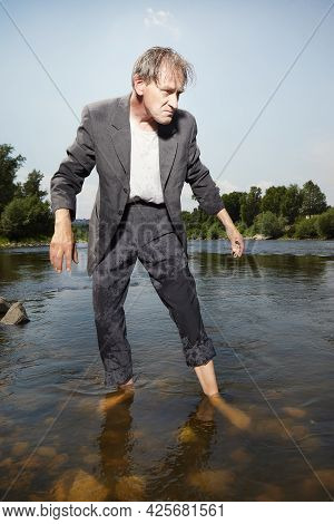 Manager In Grey Suit Became Crazy Of Hot Weather And Cooling In River