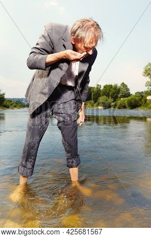Manager In Grey Suit Became Crazy Of Hot Weather And Cooling In River