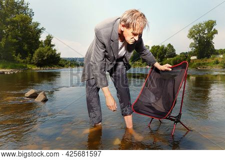 Manager In Grey Suit Became Crazy Of Hot Weather And Cooling In River