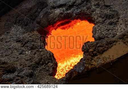 Metallurgical Ladle. At The Top Of The Bucket There Is A Solidified Stone Crust. The Inside Of The B