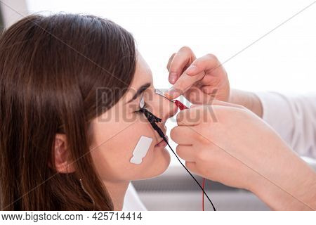 Patient Nerves Testing Using Electromyography At Medical Center
