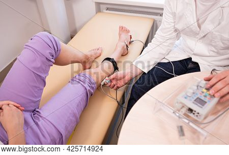 Patient Nerves Testing Using Electromyography At Medical Center