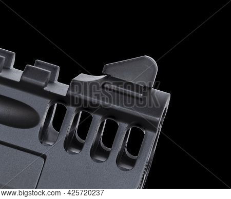 Front Sight And Muzzle Of A Large-caliber Semi-automatic Handgun On A Black Background.