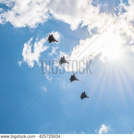 Moscow, Russia - May, 05, 2021: Four Sukhoi Su-57 Felon Flying Over Red Square During The Preparatio