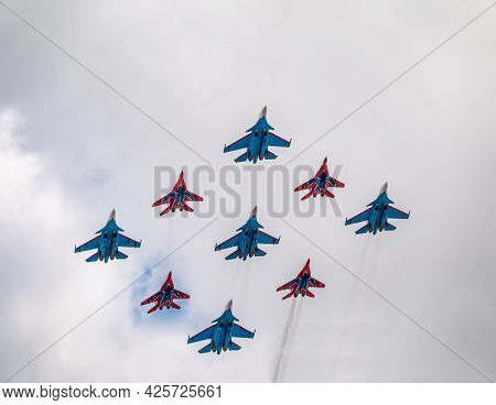 Moscow, Russia - May, 05, 2021: Diamond-shape Of 4 Mig-29 The Russian Knights And 5 Su-27 Swifts In 