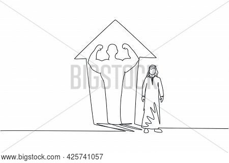 Continuous One Line Drawing Of Young Arab Businessman Standing With Muscular Shadow On Wall. Success