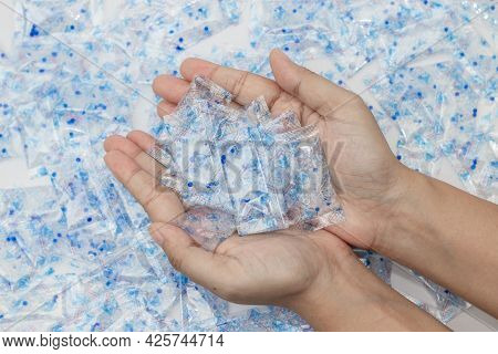 Desiccant Silica On The Pack. Closeup View. Packet Of Silica Gel Buried In Silica Crystals, Write In