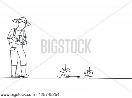 Single One Line Drawing Of Young Male Farmer Bring Crops To Be Planted In Farm Fields. Farming Chall