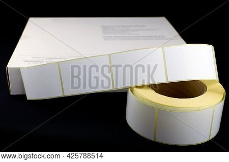 White Roll Of Labels For Thermal Perforation. Stickers For Thermal Or Thermal Transfer Printing. Bab