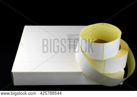 White Roll Of Labels For Thermal Perforation. Stickers For Thermal Or Thermal Transfer Printing. Bab