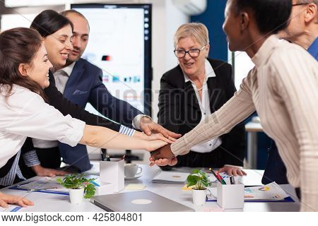 Cheerful Overjoyed Business People In Conference Room Celerating Diverse Colleagues With New Opportu