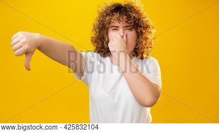 Bad Smell. Stinky Breath. Unhealthy Food. Weight-loss Sweating. Disgusted Overweight Young Woman Wit