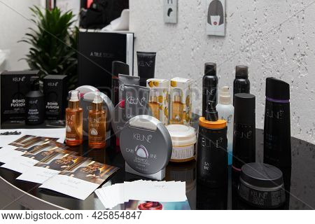 A Table With Keune Haircosmetics Product Line.