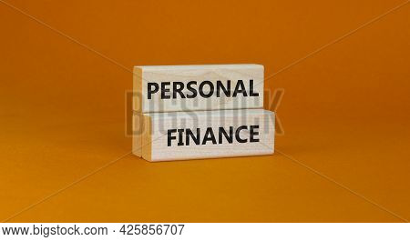 Personal Finance Symbol. Wooden Blocks With Words Personal Finance On Beautiful Orange Background, C