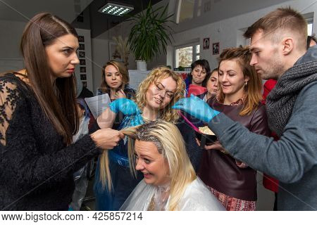 Keune Brand Technologist Artem Raychuk Dyes The Hair Of A Model On Advertising Workshop