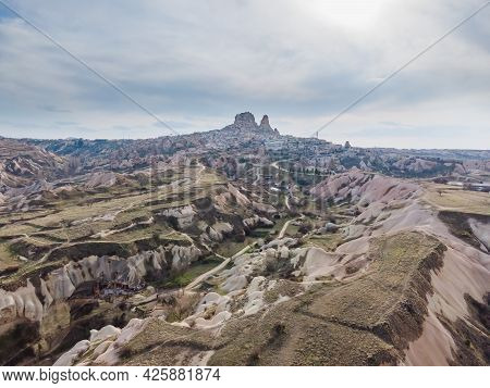 Uchisar Cave Town, Aerial View Of Uchisar Castle In Cappadocia Valley In Turkey Goreme