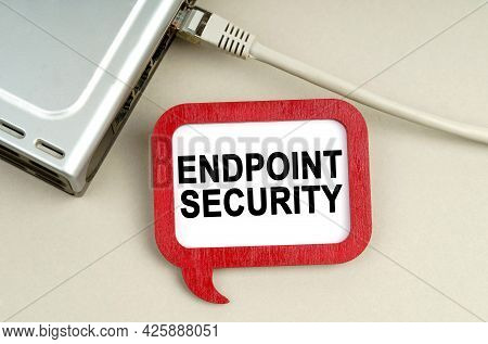 Internet And Security Concept. There Is A Router Connected To The Network On The Table, Next To A Si