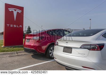 Indianapolis - Circa July 2021: Tesla Electric Vehicles Awaiting Preparation For Sale. Tesla Product