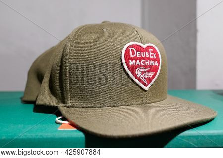 Montpellier , Ocitanie France  - 06 30 2021 : Deus Logo Brand And Sign Text On Cap In Fashion Clothe