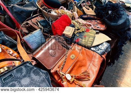 Lviv, Ukraine - May 16, 2021 : Vintage Luxury Leather Bags And Other Vintage Things On Flea Market O