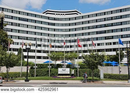 Washington, Usa - June 14, 2013: People Walk By 4-star Washington Plaza Hotel. There Are About 130 H