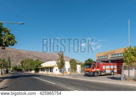 De Doorns, South Africa - April 20, 2021: A Street Scene, With A Fire Station, Fire Truck And House,
