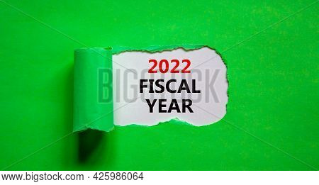 2022 Fiscal New Year Symbol. Words '2022 Fiscal Year' Appearing Behind Torn Green Paper. Beautiful G