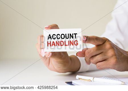 Phrase Account Handling Written On A White Paper Card
