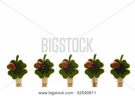 Cloverleaf with wooden beetle