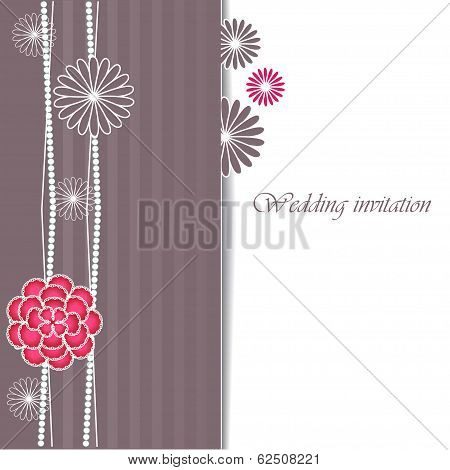 Wedding invitation card with floral elements.