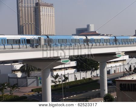 Train approaching Oud Metha Metro Station in Dubai, UAE