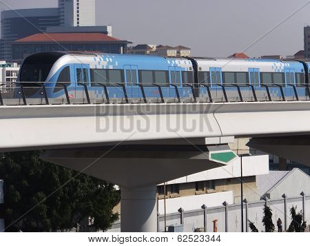 Train approaching Oud Metha Metro Station in Dubai, UAE