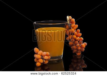 Sea Buckthorn Juice On Black.