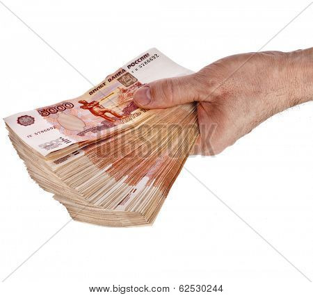 Heap of One Million Russian  Banknotes Rubles in man hand - isolated on white background