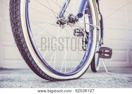 Bike with a flat tire, shallow focus